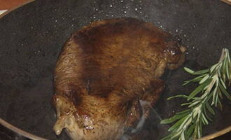 Add garlic and rosemary to the pan for flavor.Cook the treat for about two more minutes.