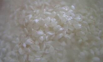 Rinse the rice several times with cold water and boil until tender. Take the ratio of rice and water 1:2. 