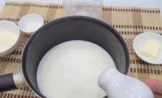 After boiling, add a pinch of salt to the milk.