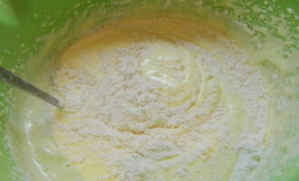 Sift the flour into this mixture and mix everything carefully so that there are no lumps.