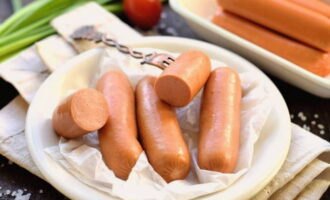 Appetizing boiled sausages are ready. Serve them with a side dish and enjoy!