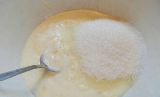 In a deep bowl, combine the yogurt with the remaining glass of sugar. Mix.