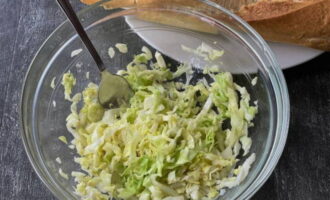 Finely chop the cabbage and season with salt, vinegar and olive oil - knead with your hands until the juice releases.