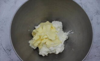 A cake made from ready-made cake layers is very simple to prepare. Using a mixer at moderate speed, beat the cheese and butter at room temperature.