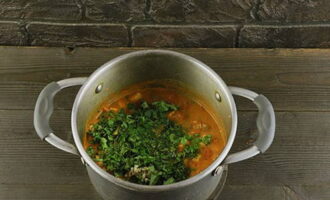 Five minutes before readiness, add garlic and cilantro. Stir and remove from the stove.