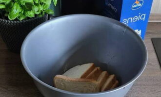 Place white bread in a bowl.