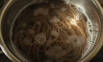 Boil water in a saucepan and add salt. Ship the soba and cook according to the instructions on the back of the package.