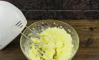 Place the dry butter in a bowl, add salt and sugar. Combine with an electric device until the mass becomes larger.