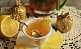 Pour the fragrant tea into cups. Serve with a lemon wedge and honey.