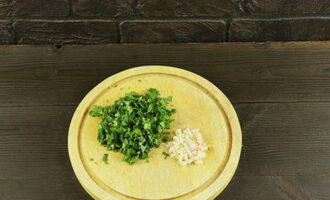 Chop cilantro and garlic.