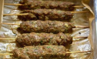 Bake lula kebab for at least 40 minutes.