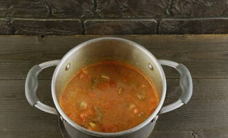 Simmer until one quarter of the liquid evaporates.