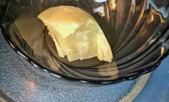 Place the melted butter in a bowl and melt it in the microwave.