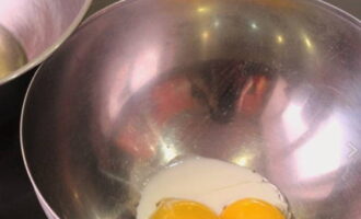 First, separate the egg yolks from the whites using any convenient method. Combine the yolks with a tablespoon of cream and salt to taste.