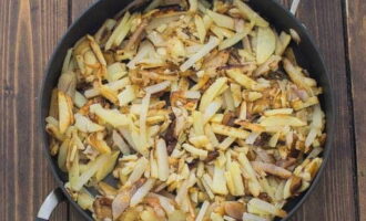 Fry for about 15 minutes over medium heat. Salt to taste and add chopped garlic.