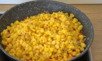 Add corn for frying. Stir and continue sautéing.