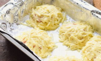 Cover the top with a potato layer. Place in a hot oven and bake for half an hour.