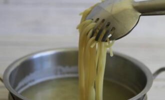 Boil the pasta in salted water until ready. Place in a colander.