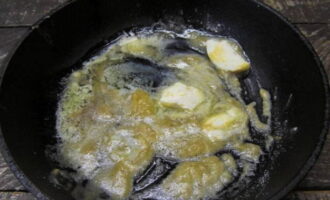 Add butter here. Continue frying until it melts. Constantly stir the contents.