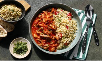 Pork gravy in a frying pan with flour and tomato paste is ready. Serve with a side dish!