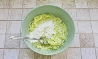 Season with dried basil and add sifted flour, knead the base.