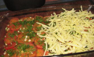 Sprinkle with chopped garlic and herbs. Cover everything with grated cheese.