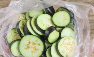 Place the prepared eggplants in a freezer bag or container.