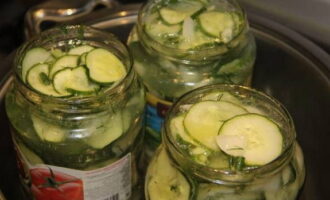 Place the treats in sterile jars. Place them in a water bath and sterilize for 30 minutes. Then close the lids and let cool completely.