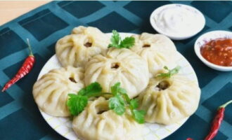 We serve appetizing bouzas and decorate them with fresh herbs. Bon appetit! 