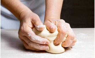 Knead the dough thoroughly until soft, adding cheese shavings.