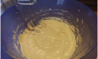 Continuing to beat the butter, add the egg mixture.