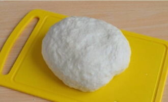 Using your hands, knead the dough into a soft and elastic dough.