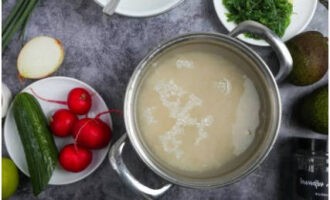 Wash the rice well and cook until tender. Then mix with dressing.