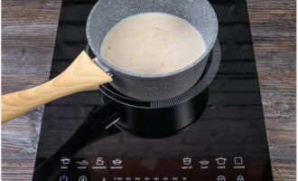 Gradually add milk and stir until no lumps remain.Salt and pepper, add sugar. Boil for no more than 7 minutes until thickened. Remove from the stove and let cool. Bechamel sauce is ready.