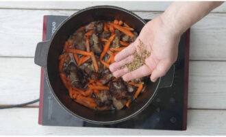 Add carrots, crushed cumin, coriander and barberry. Salt to taste. Fry for about 10 minutes.