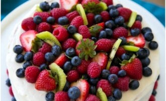 Decorate the cake with fresh berries and fruit slices, leave to soak in the refrigerator for a couple of hours. A delicious dessert for your holiday is ready. Bon appetit!