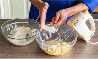 Sift flour with baking powder and salt here. Knead the dough using a mixer.