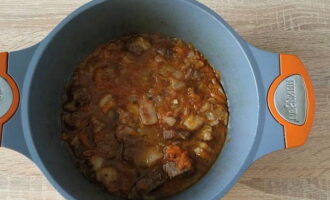 Simmer the beef over low heat for an hour. Add hot water if necessary. 