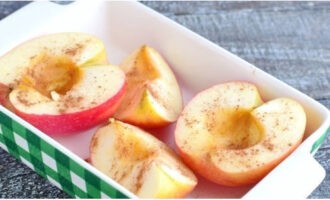 Season the apples with ground cinnamon.