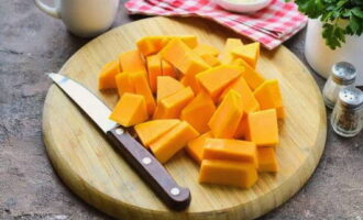 Cut the pumpkin into medium-sized cubes.