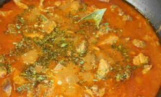 When the beef is ready, check the goulash for taste and add salt if necessary. Finally, add the dried herbs and simmer for another 5 minutes. 