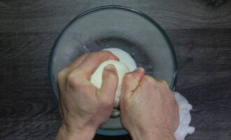 If you have homemade cottage cheese, squeeze out the excess whey through cheesecloth.