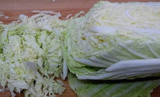 Shred Beijing cabbage into strips.